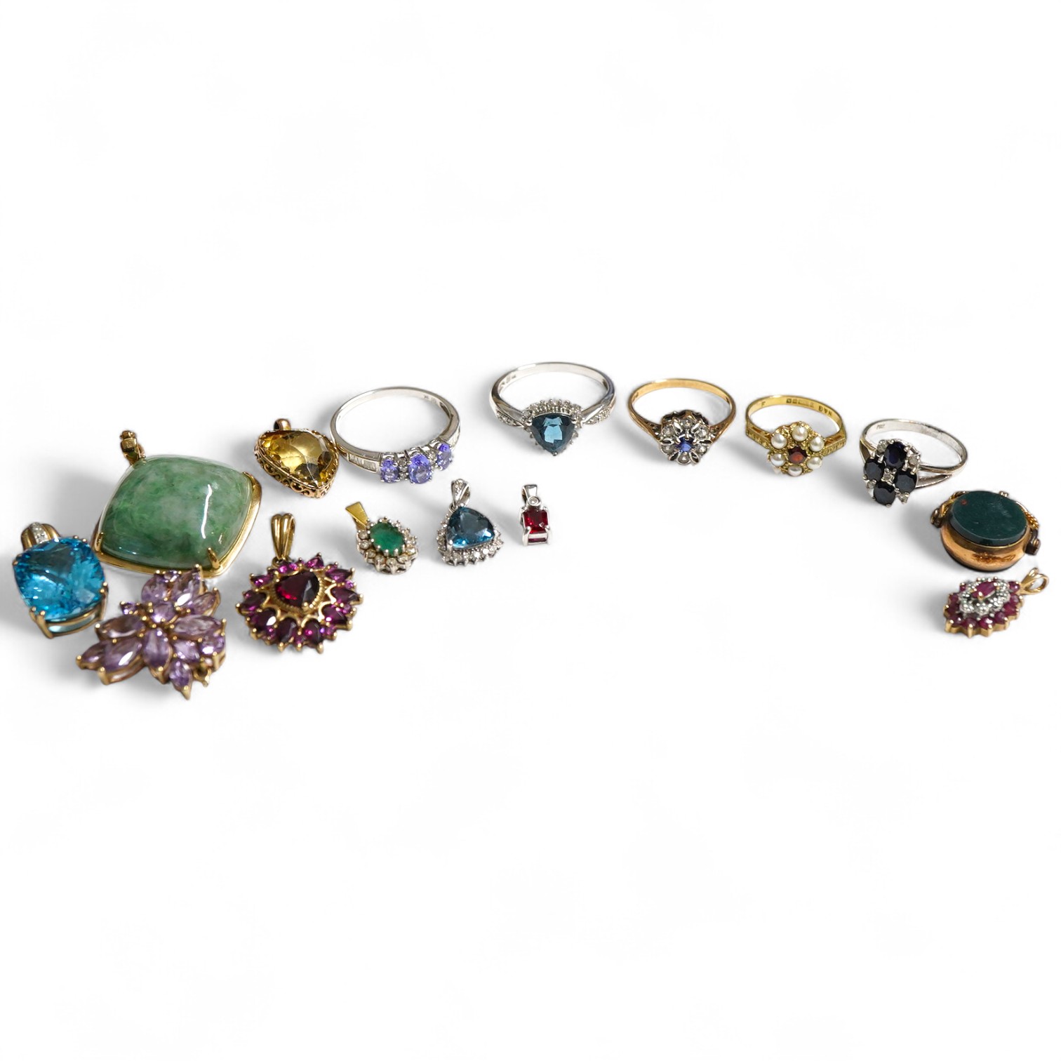 A small group of jewellery to include, four modern 9ct gold and gem set rings including garnet and seed pearl cluster and sapphire and diamond cluster, one other modern 9k and gem set ring, five assorted 9ct and gem set